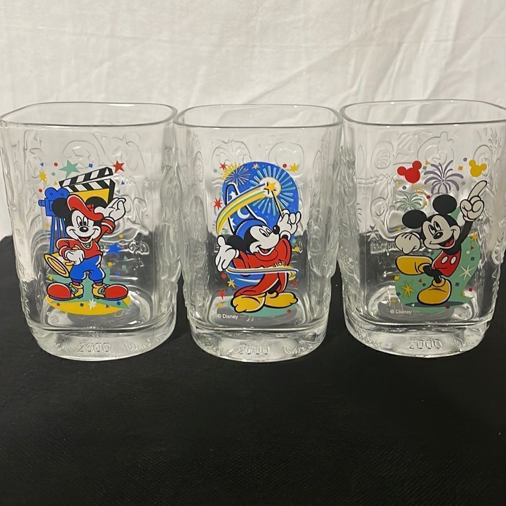 Three 2000 Walt Disney world drinking glasses